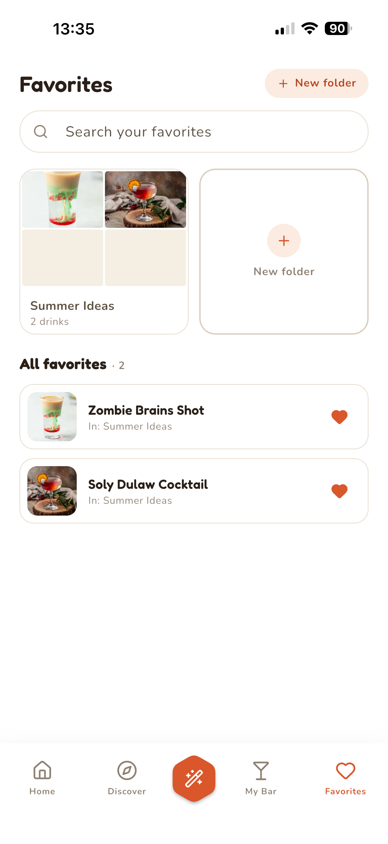Favorites screen with a Summer Ideas folder and two saved cocktails